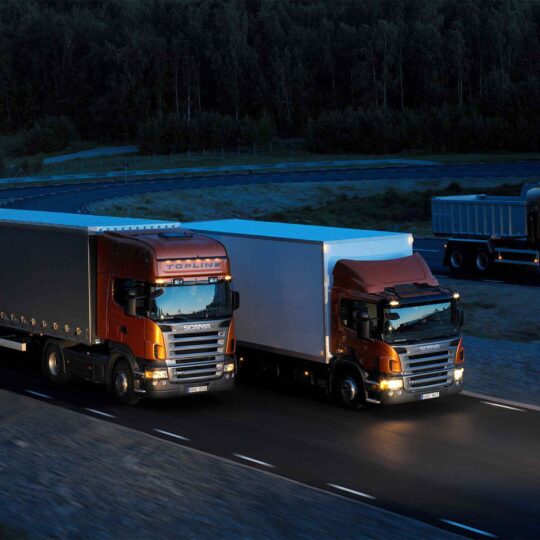 Three-orange-Scania-trucks-540x540.jpg